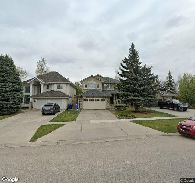 Street view of 1693 Evergreen Drive SW, Calgary