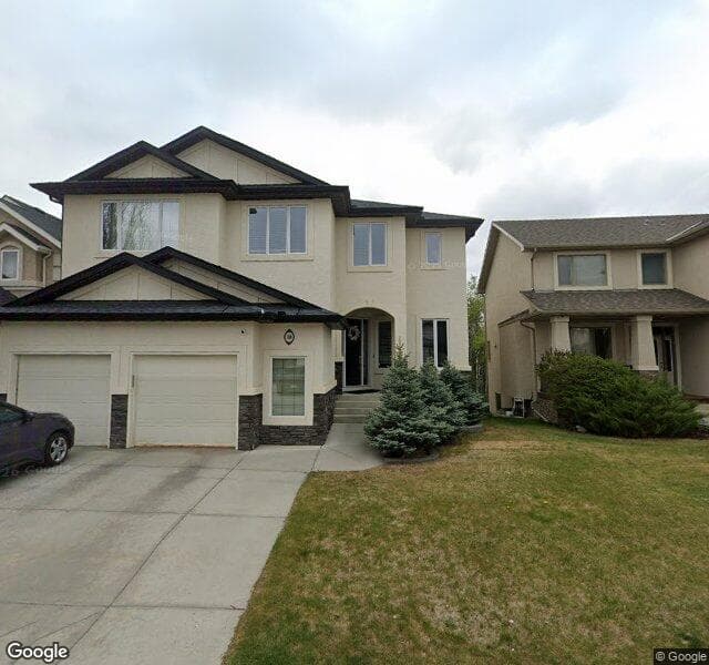 Street view of 104 Everglade Circle SW, Calgary