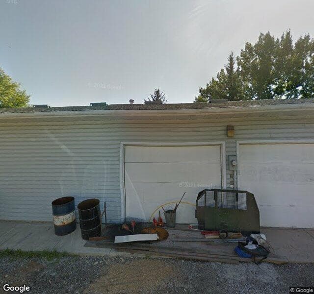 Street view of 128 Queen Anne Place SE, Calgary