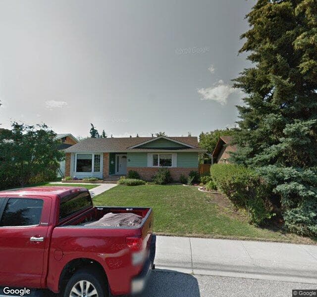 Street view of 19 Lake Patricia Place SE, Calgary