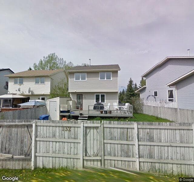 Street view of 132 Woodglen Close SW, Calgary