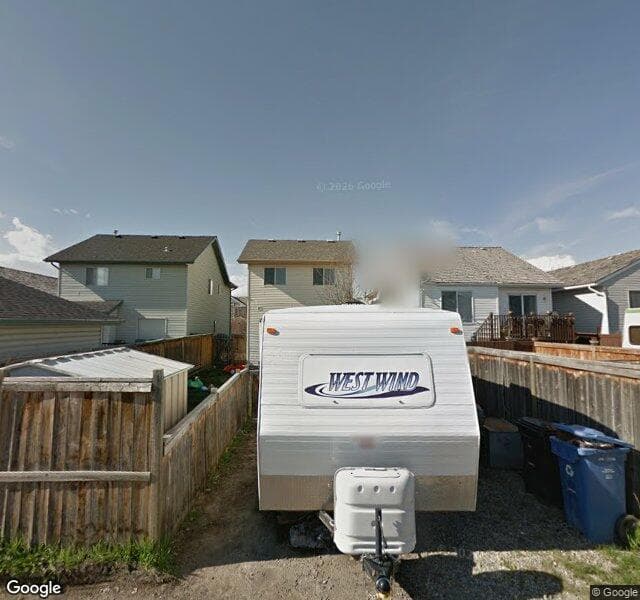 Street view of 304 Mount Apex Green SE, Calgary