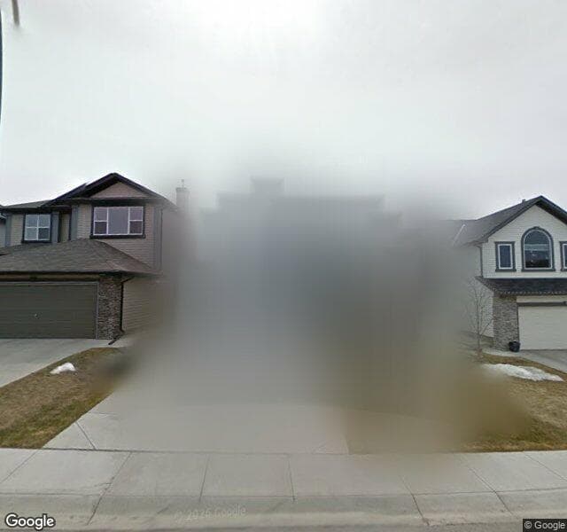 Street view of 113 Rockbluff Place NW, Calgary