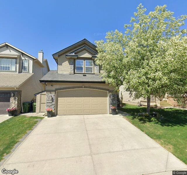 Street view of 124 Cougarstone Manor SW, Calgary