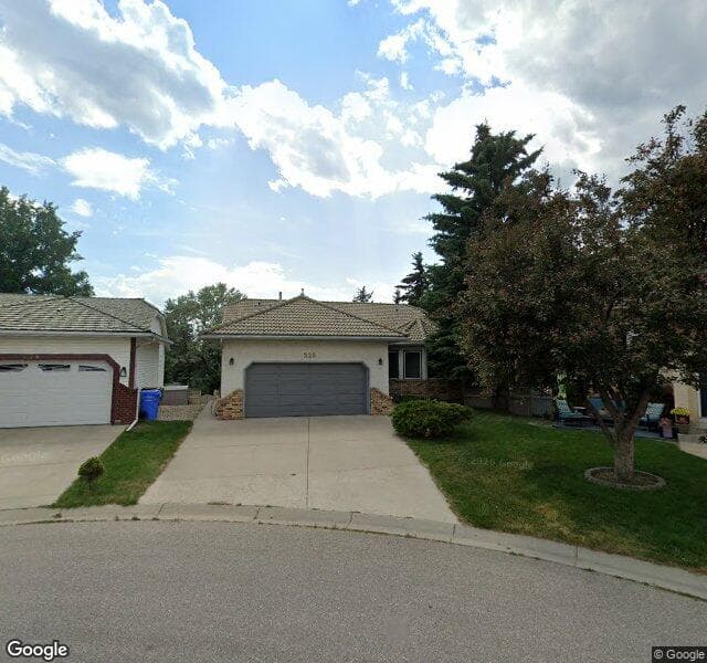 Street view of 220 Diamond Point SE, Calgary