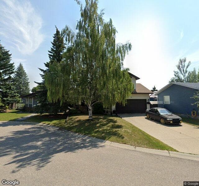 Street view of 119 Cedardale Bay SW, Calgary