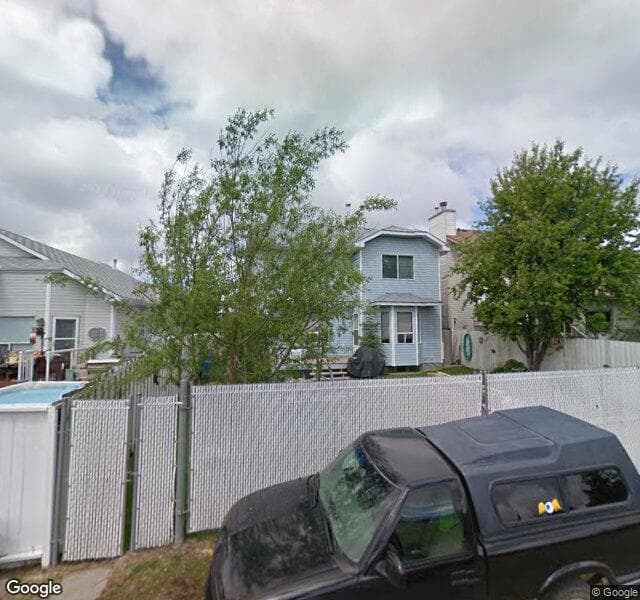Street view of 164 Riverglen Drive SE, Calgary