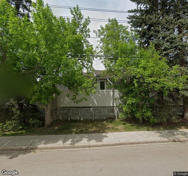 Street view of 104 Bow Landing NW, Calgary