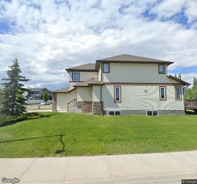 Street view of 2 Cougarstone Close SW, Calgary