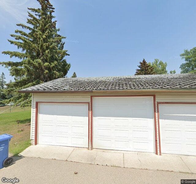 Street view of 119 Woodvale Road SW, Calgary