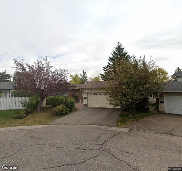 Street view of 132 Woodview Place SW, Calgary