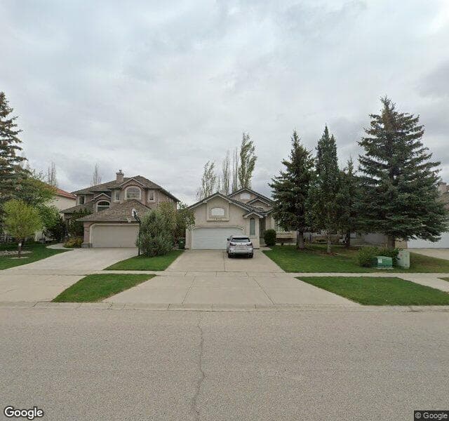 Street view of 1633 Evergreen Drive SW, Calgary