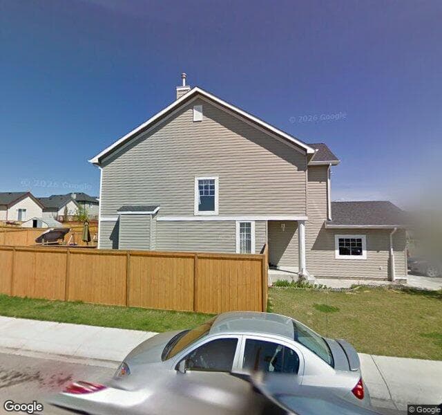 Street view of 1059 Bridlemeadows Manor SW, Calgary