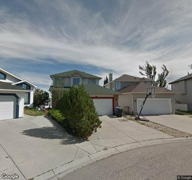 Street view of 319 Hidden Cove NW, Calgary