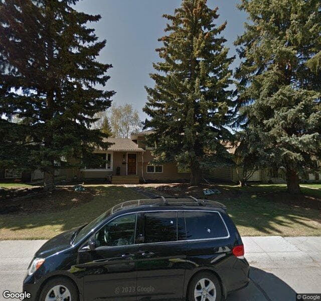 Street view of 1023 Lake Twintree Drive SE, Calgary
