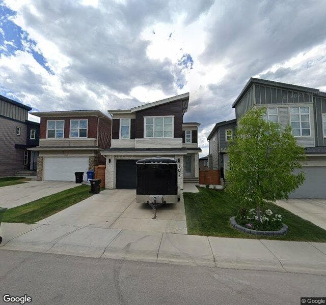 Street view of 302 Carringvue Manor NW, Calgary