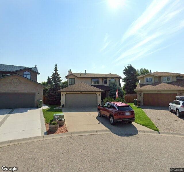 Street view of 1065 Deer River Circle SE, Calgary