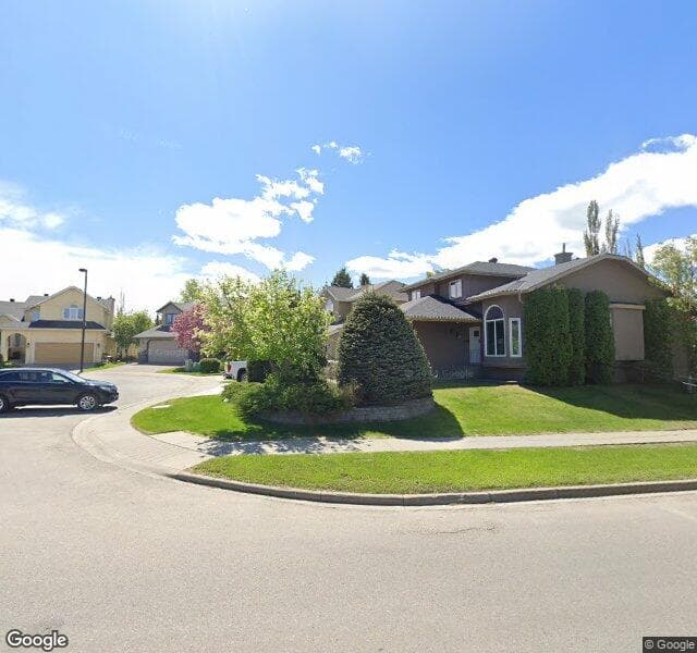 Street view of 321 Mckenzie Lake Cove SE, Calgary