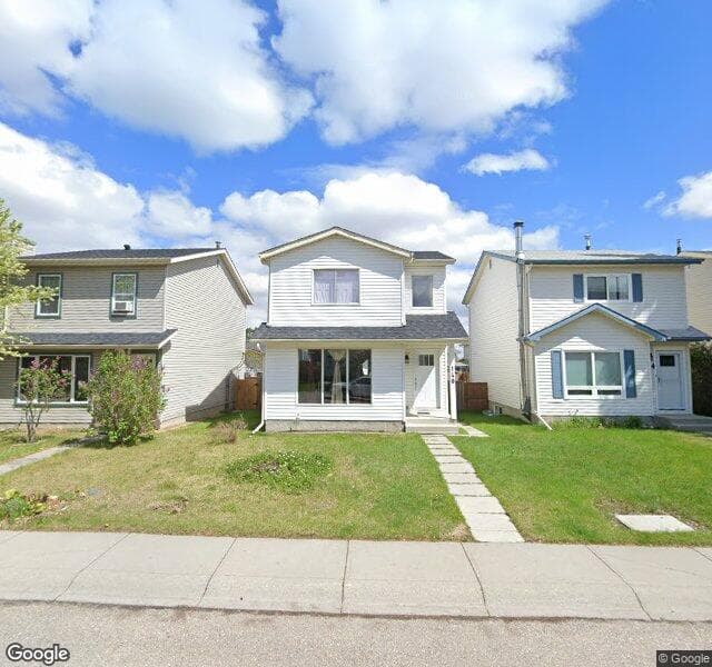 Street view of 140 Millcrest Way SW, Calgary