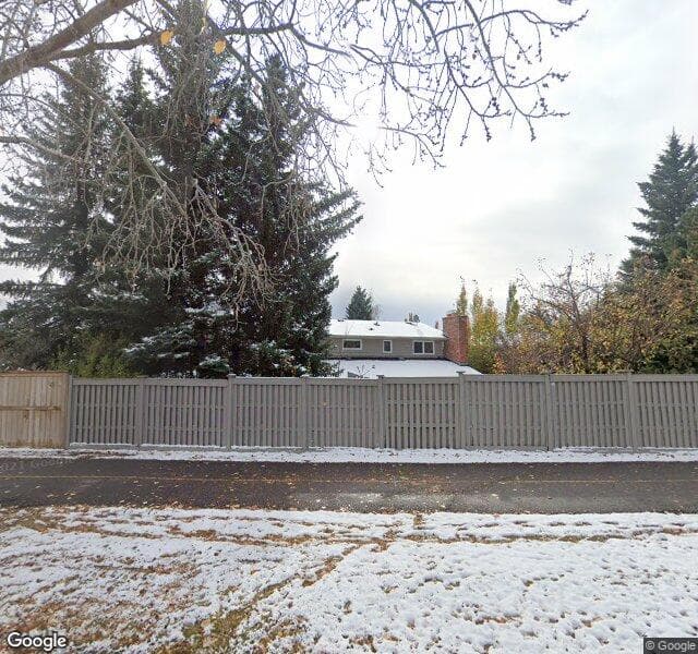 Street view of 16 Woodacres Court SW, Calgary