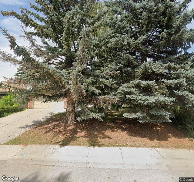 Street view of 216 Pump Hill Crescent SW, Calgary