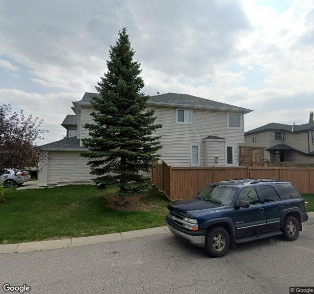 Street view of 231 Tuscany Ravine Close NW, Calgary