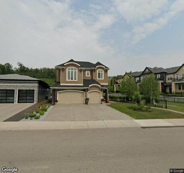 Street view of 124 Cranbrook Drive SE, Calgary