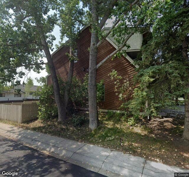 Street view of 179 Woodvale Bay SW, Calgary