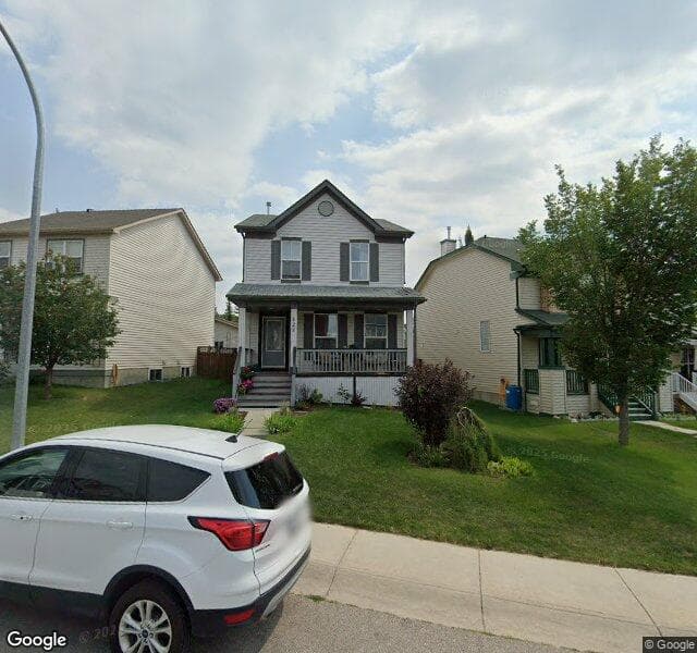 Street view of 127 Tuscany Ridge Common NW, Calgary