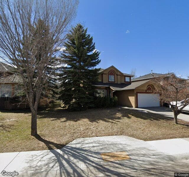 Street view of 15499 Mckenzie Lake Way SE, Calgary