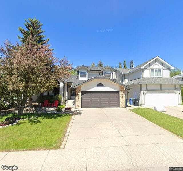 Street view of 173 Woodford Drive SW, Calgary