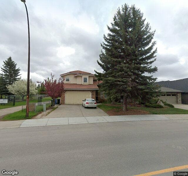 Street view of 1002 Shawnee Drive SW, Calgary