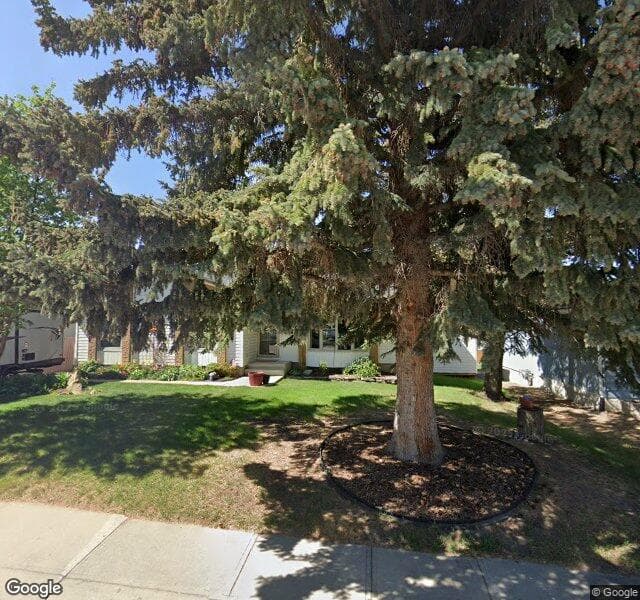Street view of 1228 Hunterquay Hill NW, Calgary