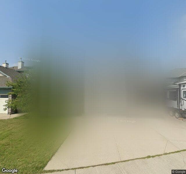 Street view of 161 Cougarstone Place SW, Calgary