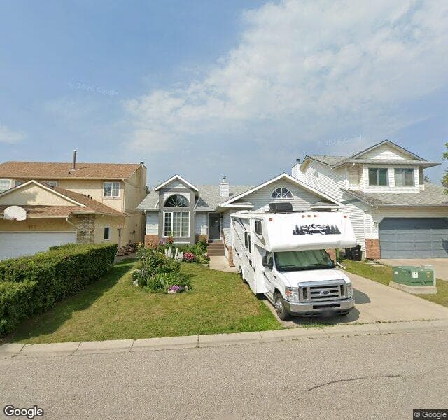 Street view of 156 Wood Valley Drive SW, Calgary