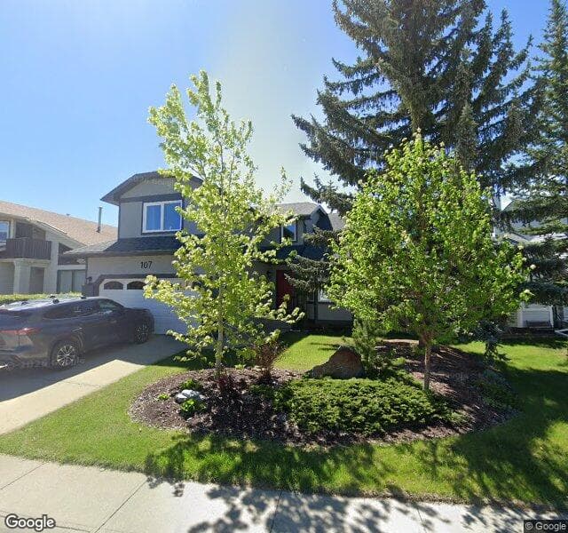 Street view of 107 Wood Valley Drive SW, Calgary