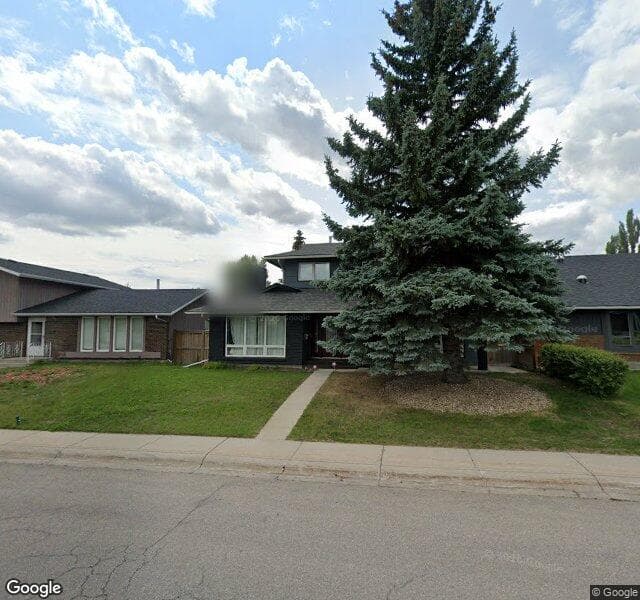 Street view of 1558 Lake Bonavista Drive SE, Calgary