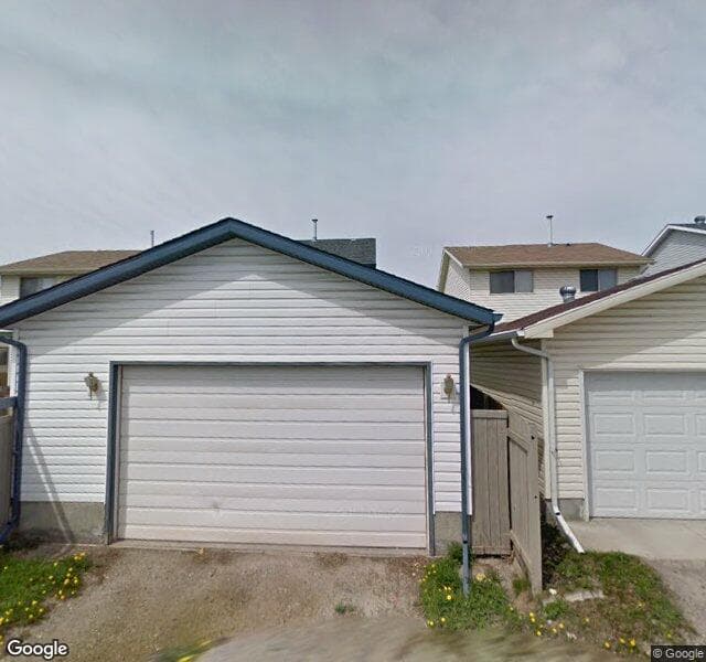 Street view of 128 Woodglen Grove SW, Calgary