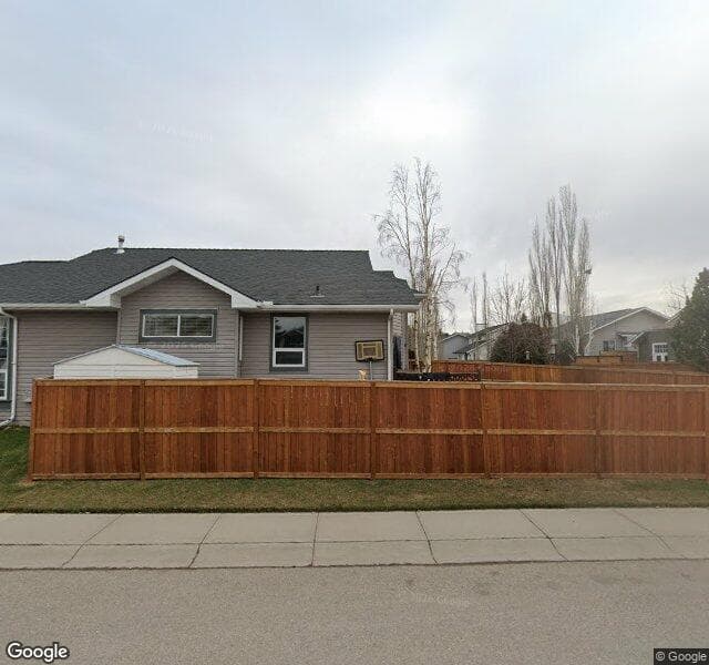 Street view of 156 Riverstone Close SE, Calgary