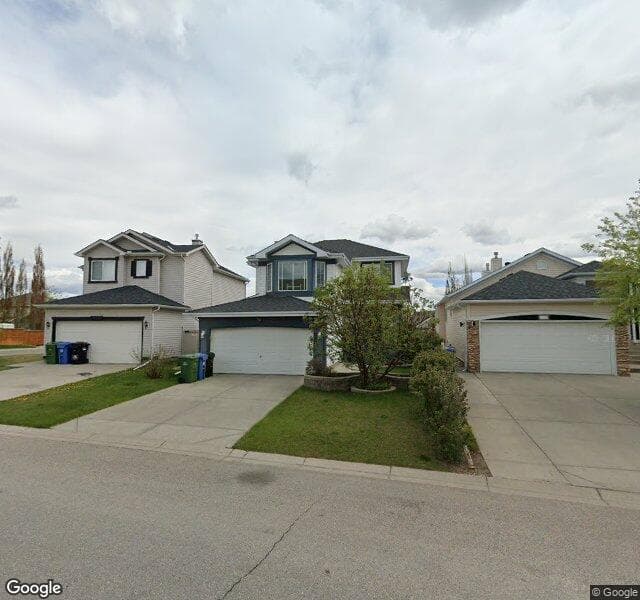 Street view of 109 Rocky Ridge Cove NW, Calgary