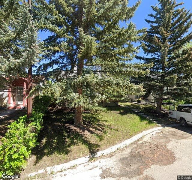 Street view of 116 Woodglen Close SW, Calgary