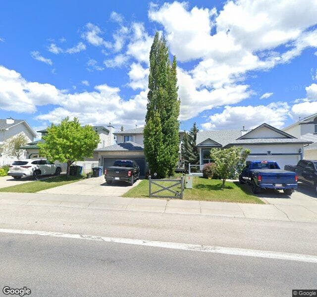 Street view of 10338 Hidden Valley Drive NW, Calgary
