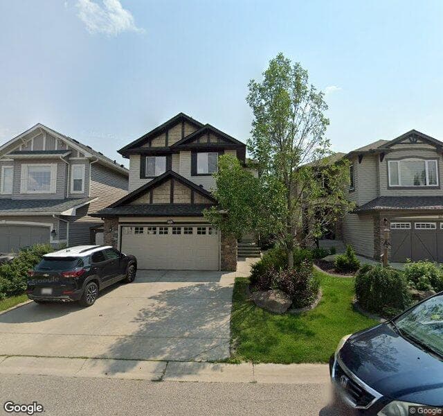 Street view of 165 Brightonstone Bay SE, Calgary