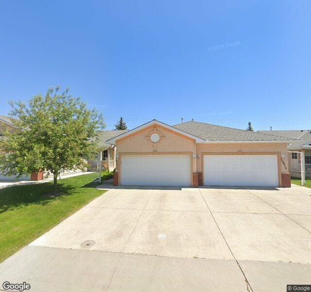 Street view of 10976 Harvest Lake Way NE, Calgary