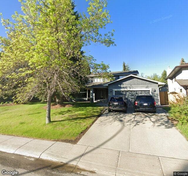 Street view of 2216 Lake Bonavista Drive SE, Calgary