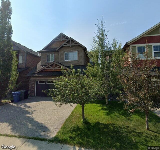 Street view of 17 Cougar Ridge Cove SW, Calgary