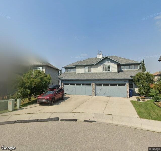 Street view of 153 Cougarstone Place SW, Calgary
