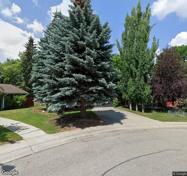 Street view of 128 Lake Wood Place SE, Calgary