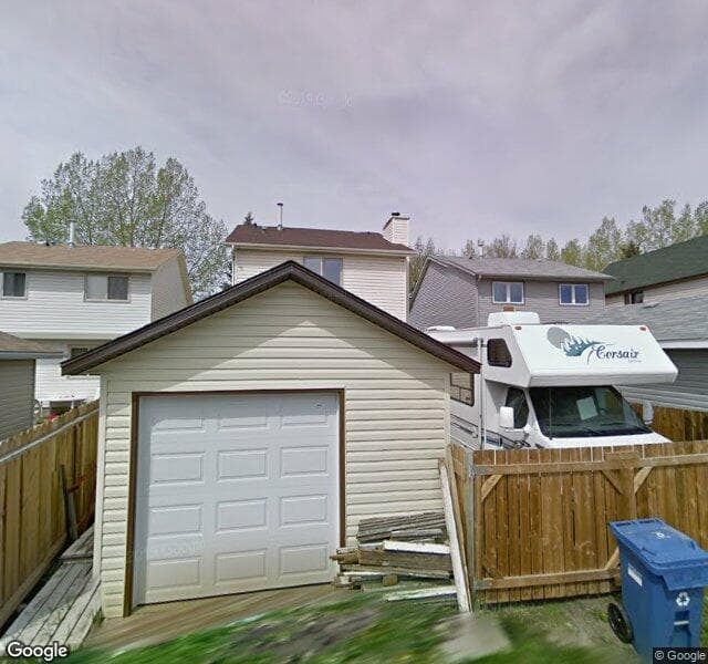 Street view of 152 Woodglen Close SW, Calgary