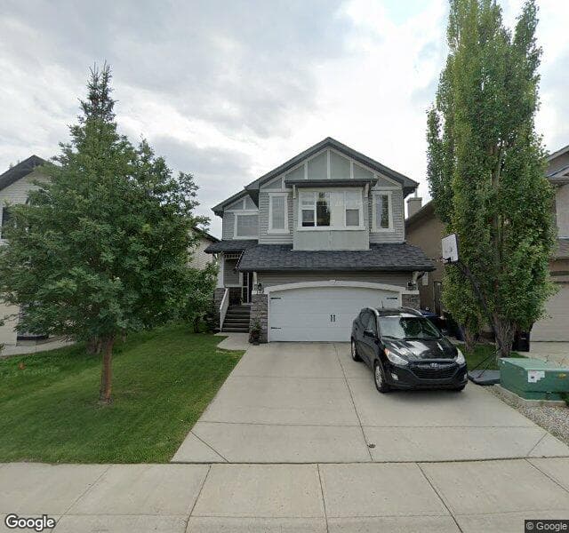 Street view of 158 Tuscany Ravine Close NW, Calgary